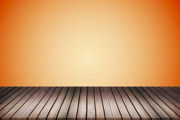 Holz Tischplatte auf leicht orangefarbenem Farbverlauf abstrakten Hintergrund - ca — Stockfoto