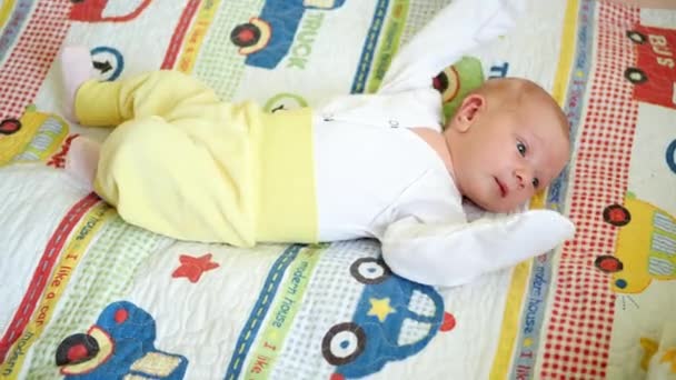 Baby White Shirt Yellow Pants Lies His Back Plaid Baby — Stock Video