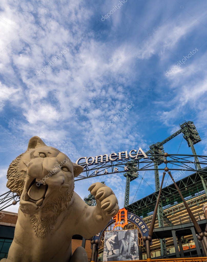 Detroit, MI - Oct 6 2019: Comerica Park is the home of Detroit Tigers baseball team. Vertical close up of the main entrance signage and the tiger at the front gate.