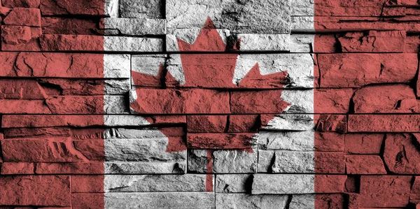 Картина под флагом Канады на высоких деталях старой кирпичной стены  . — стоковое фото