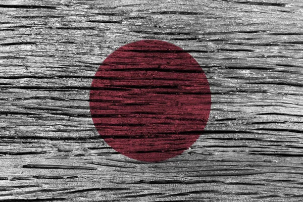 Japanse vlag met hoge detail van oude houten achtergrond . — Stockfoto