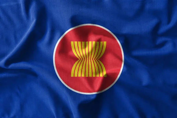 Pittura a bandiera ASEAN su alto dettaglio di tessuti di cotone ondulato. Illustrazione 3D — Foto Stock