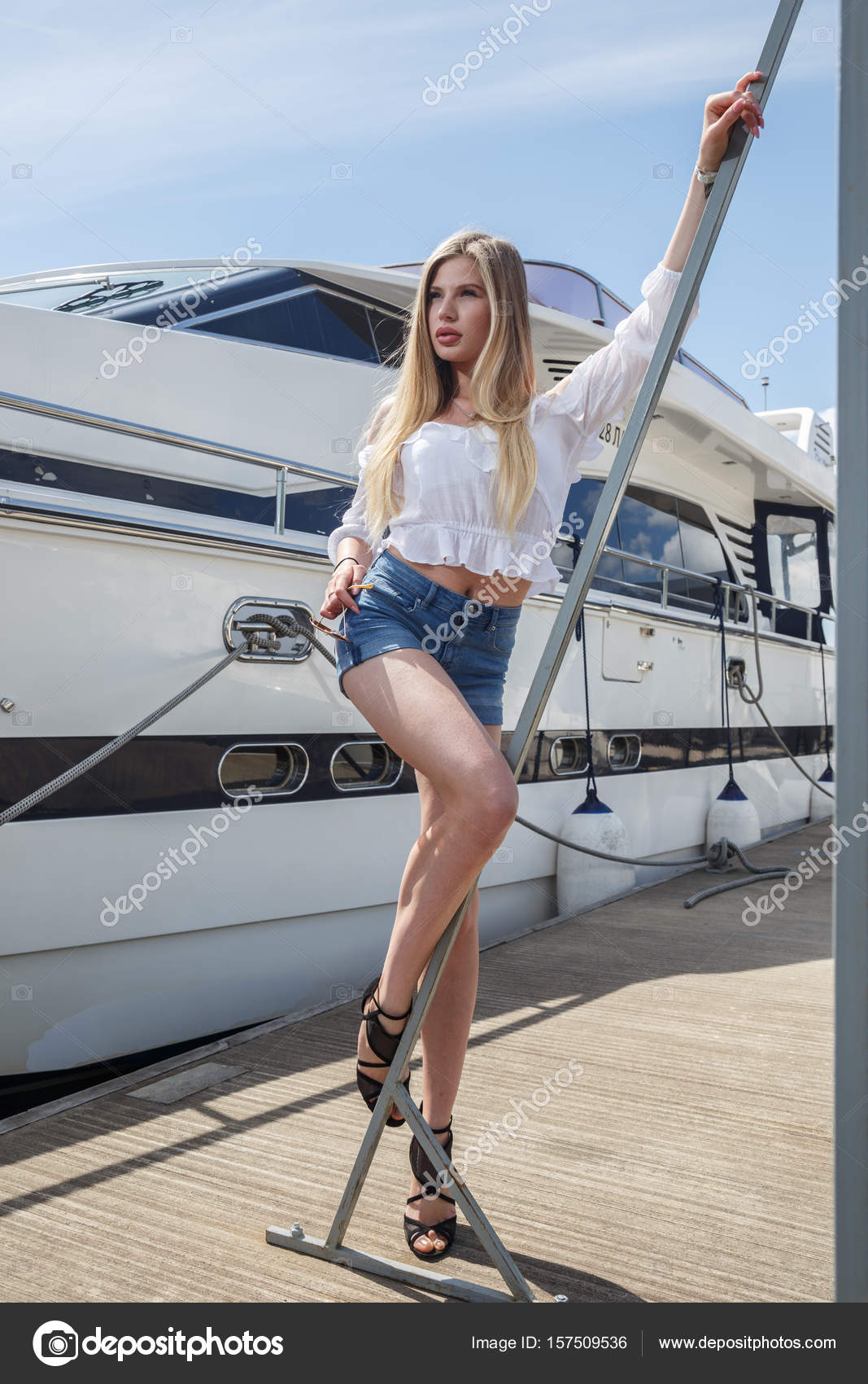 Beautiful Posing On Yacht Beautiful Posing Near Yacht Stock Photo