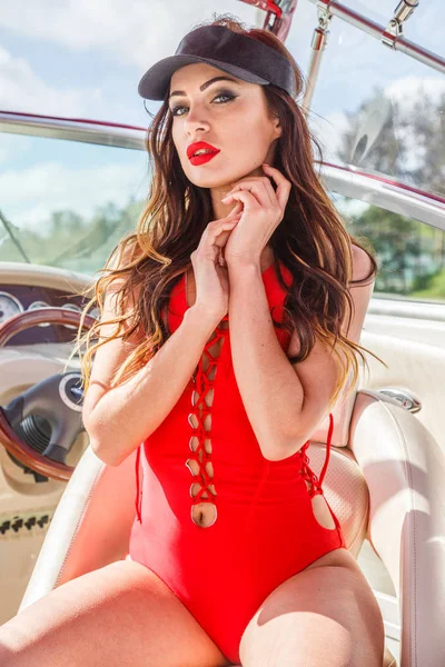 Young woman in swimsuit on yacht — Stock Photo, Image