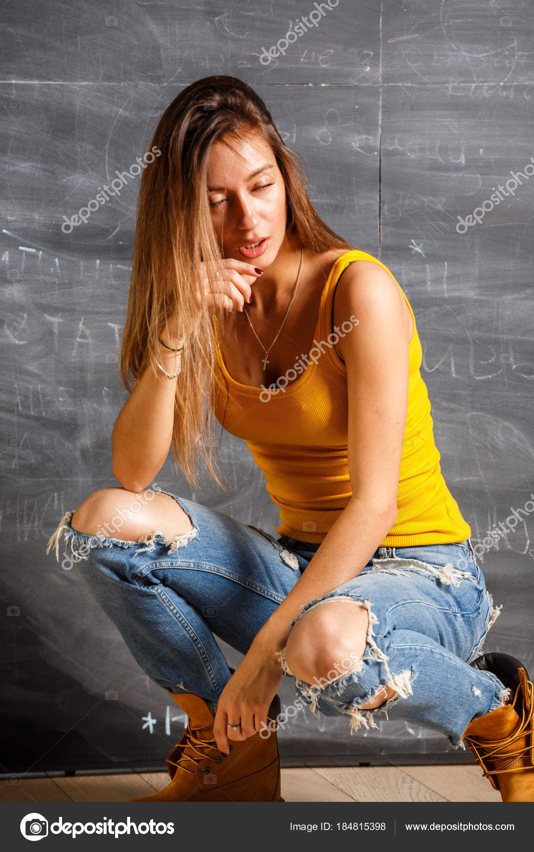 yellow t shirt with blue jeans