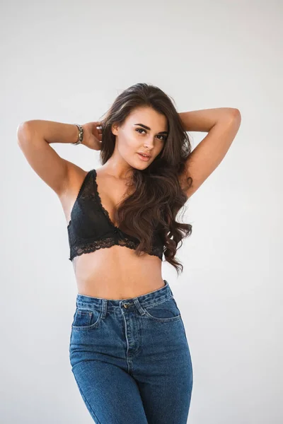 Studio Portrait Beautiful Curly Brunette Girl Wearing Blue Jeans Sexual — Stock Photo, Image