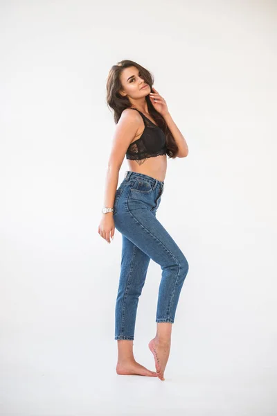 Studio Portrait Beautiful Curly Brunette Girl Wearing Blue Jeans Sexual — Stock Photo, Image