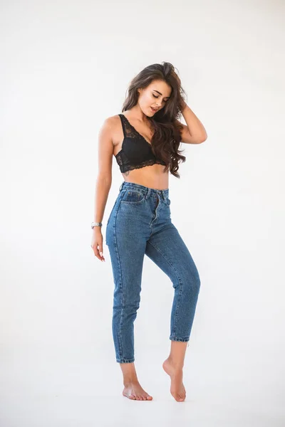 Studio Portrait Beautiful Curly Brunette Girl Wearing Blue Jeans Sexual — Stock Photo, Image