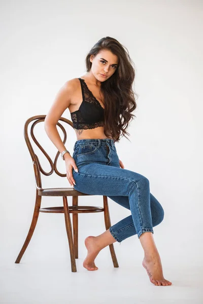 Studio Portrait Beautiful Curly Brunette Girl Wearing Blue Jeans Sexual — Stock Photo, Image