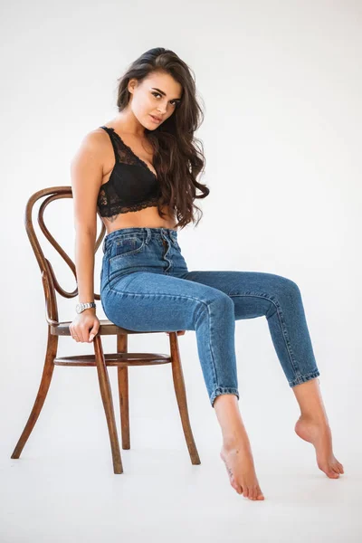 Studio Portrait Beautiful Curly Brunette Girl Wearing Blue Jeans Sexual — Stock Photo, Image