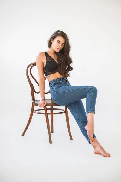 Studio Portrait Beautiful Curly Brunette Girl Wearing Blue Jeans Sexual — Stock Photo, Image