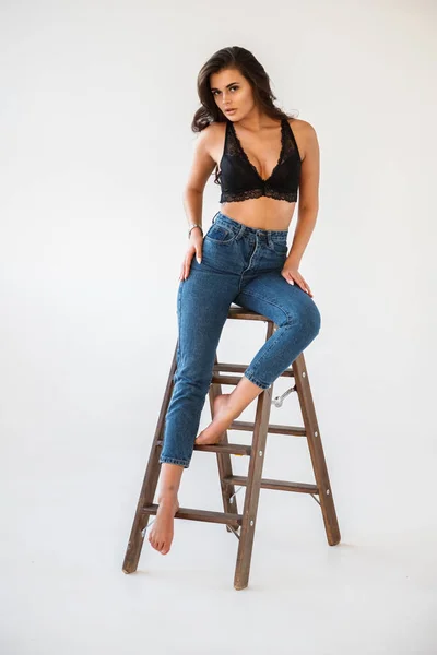 Studio Portrait Beautiful Curly Brunette Girl Wearing Blue Jeans Sexual — Stock Photo, Image