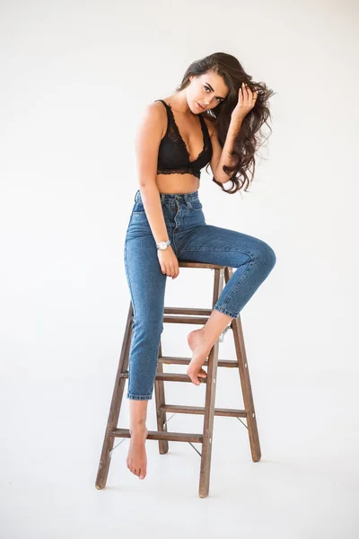 Studio Portrait Beautiful Curly Brunette Girl Wearing Blue Jeans Sexual — Stock Photo, Image