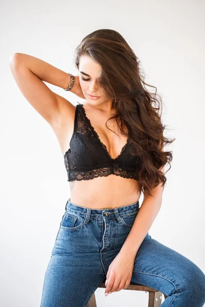 Studio Portrait Beautiful Curly Brunette Girl Wearing Blue Jeans Sexual — Stock Photo, Image