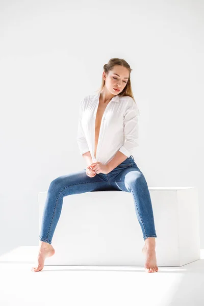 Portrait Sexy Blonde Girl Wearing Blue Jeans White Shirt Sitting — Stock Photo, Image