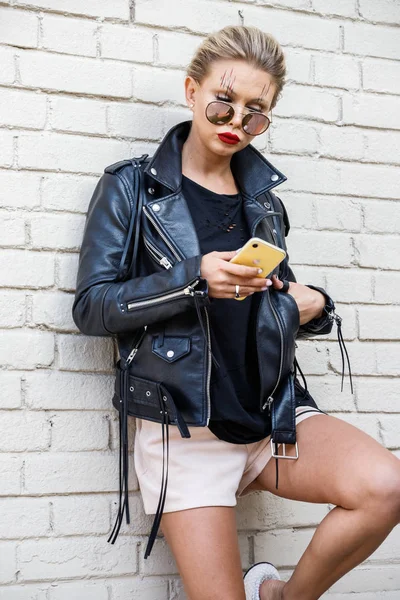 Beautiful Blonde Girl Black Jacket Glasses Posing White Brick Wall — 스톡 사진