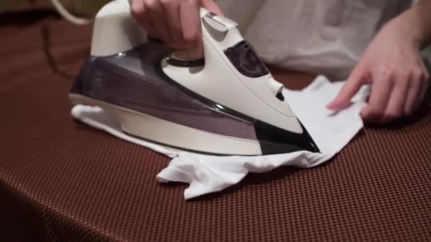 Mother Ironing Baby Clothes Close Face — Stock Video