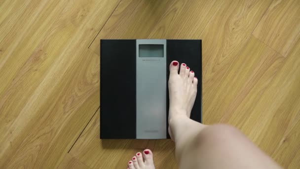 Woman Gets Scales Sees Her Weight Kilograms Figure Lights Screen — Stock Video