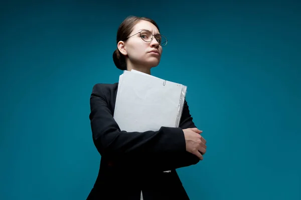 Young Woman Glasses Looks Camera Holding Documents Female Boss Blue — Stock Photo, Image