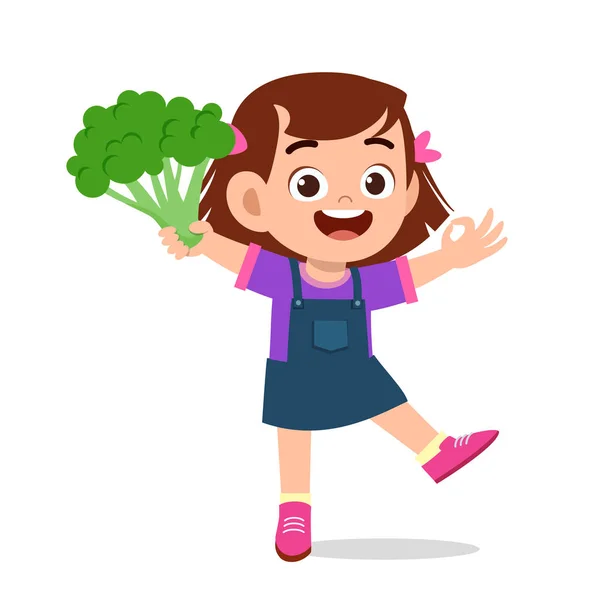 Felice ragazza carina bambino che tiene verdura fresca — Vettoriale Stock