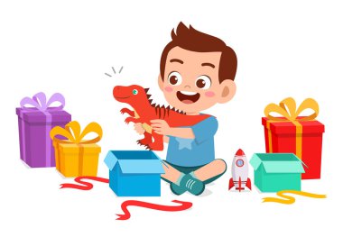happy cute little kid boy open gift from birthday