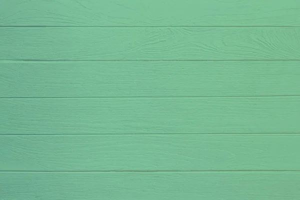 Klasik yeşil ahşap arka plan. Yeşil renge boyanmış eski tahta..