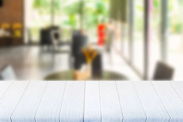 Weißer Holztisch Café Verschwommener Hintergrund lizenzfreie Stockbilder
