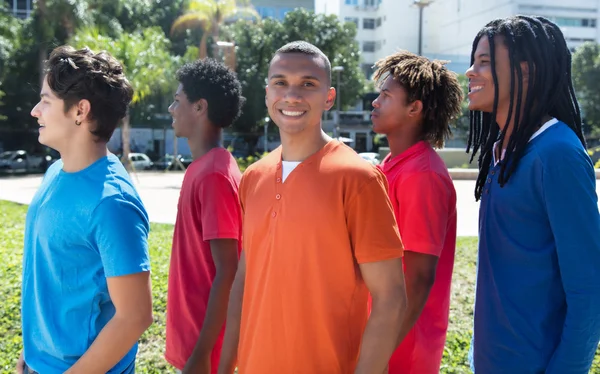 Group of five male young adults in the city — Stock Photo, Image