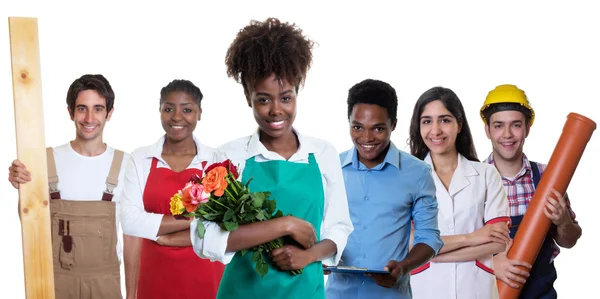 Laughing florista americano africano com grupo de outros internatio — Fotografia de Stock