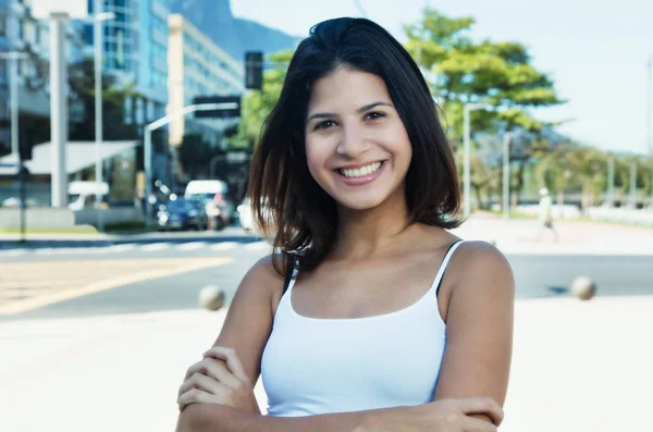 Cute caucasian woman in the city in the summer — Stock Photo, Image