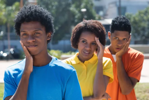 Grupo de três jovens afro-americanos tristes — Fotografia de Stock