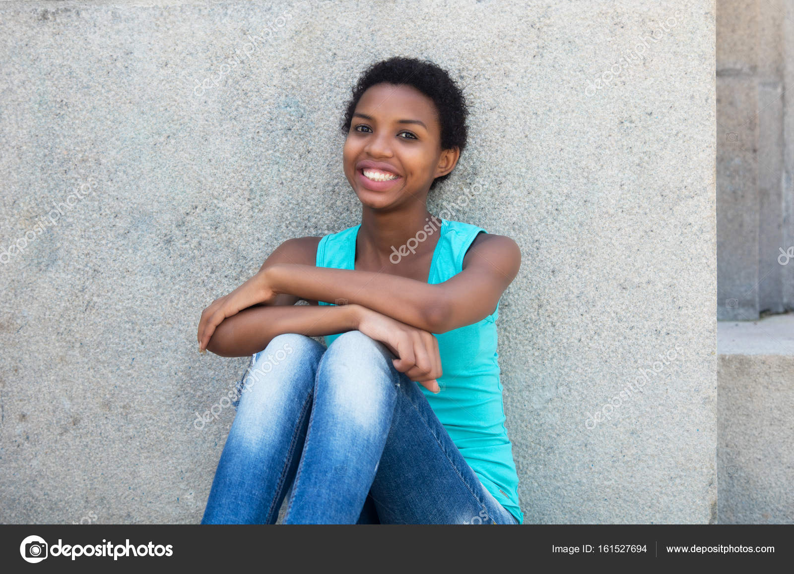 Relaxing African American Woman With Short Hair Stock Photo