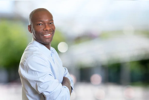 African american businessman with crossed arms — Stock Photo, Image
