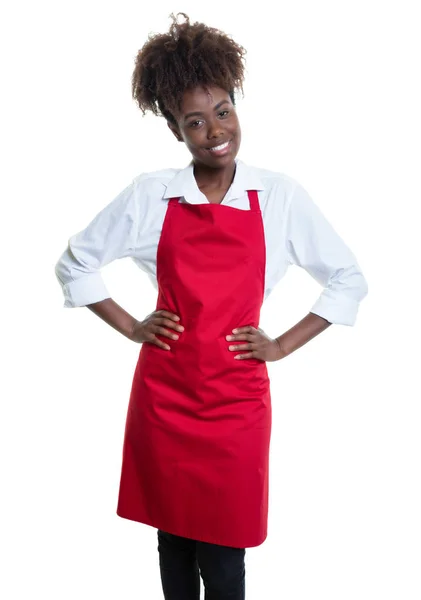 Camarera afroamericana de trabajo con delantal rojo — Foto de Stock