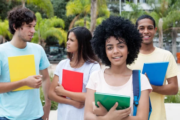 Group of international students on campus — Stock Photo, Image