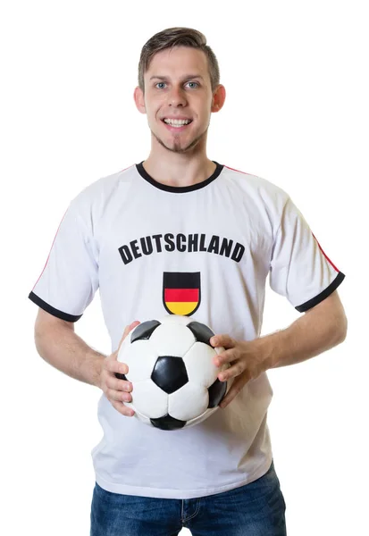 Смеющийся немецкий футбольный фанат с мячом — стоковое фото
