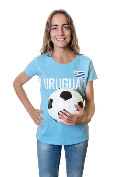 Смеющийся футбольный фанат из Уругвая с мячом — стоковое фото