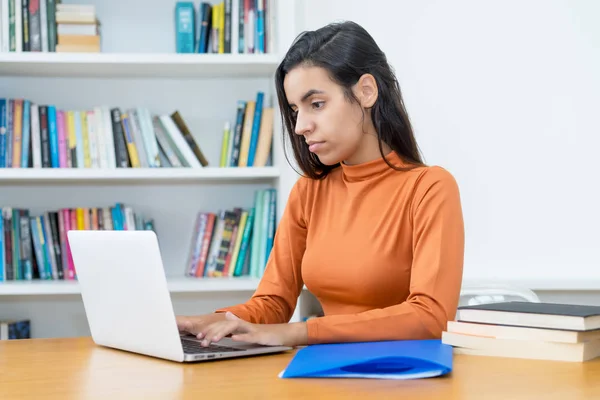 Young turkish female student learning at computer — 스톡 사진