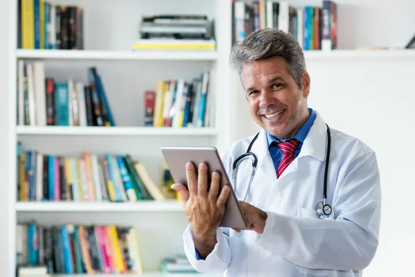 Handsome Mature Doctor Tablet Computer Clinic — Stock Photo, Image
