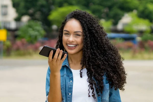 Brazilian Young Adult Woman Using Smart Phone Voice Recognition Outdoor — Stock Photo, Image