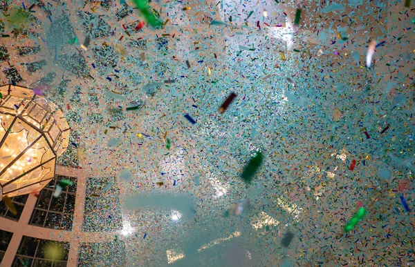Doha, Qatar- 01 January 2019: Background image of People enjoying the confetti shower — 스톡 사진