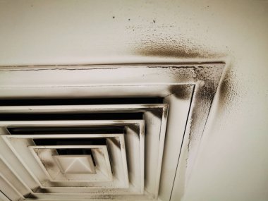 Background image of Dust out from Air Duct, Danger and the cause of pneumonia in office man.
