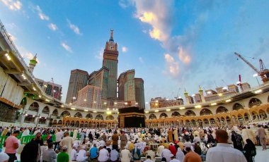 MECCA, SAUDI ARABIA - MARCH 29, 2019 The door of the Kaaba called Multazam at Grant holy mosque Al-Haram in Mecca Saudi Arabia. Muslim Pilgrims at The Kaaba in The Great Mosque of Mecca