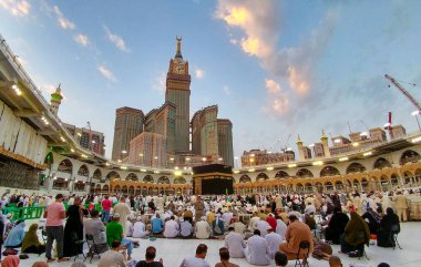 MECCA, SAUDI ARABIA - MARCH 29, 2019 The door of the Kaaba called Multazam at Grant holy mosque Al-Haram in Mecca Saudi Arabia. Muslim Pilgrims at The Kaaba in The Great Mosque of Mecca