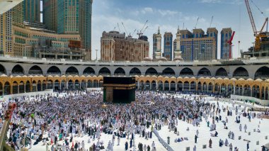 MECCA, SAUDI ARABIA - MARCH 29, 2019 The door of the Kaaba called Multazam at Grant holy mosque Al-Haram in Mecca Saudi Arabia. Muslim Pilgrims at The Kaaba in The Great Mosque of Mecca