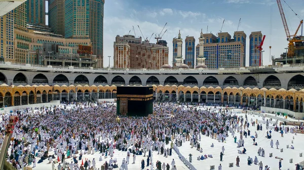 MECCA, SAUDI ARABIA - MARCH 29, 2019 The door of the Kaaba called Multazam at Grant holy mosque Al-Haram in Mecca Saudi Arabia. Muslim Pilgrims at The Kaaba in The Great Mosque of Mecca