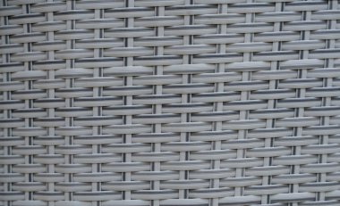 Siyah yapay rattan desenli. Sepet yapısının arka planı, yakın plan. Mobilya arkaplanı