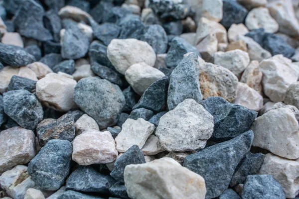 Sfondo di pietra. ghiaia blu. Texture di granito. La strada rocciosa. Materiale da costruzione. La consistenza delle pietre. Carta da parati con ghiaia fine . — Foto Stock