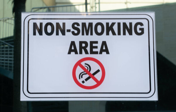 background image of a Non smoking area sign on a outdoor area
