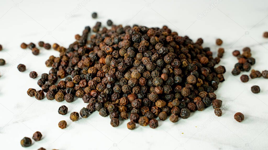 Pepper, heap of Black (cubeb) or Black Peppercorn (Cubeb),Cubeb, medicinal plant and spices